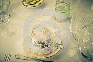 A vintage wedding cup cake in teacup