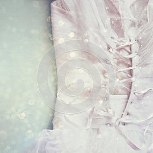 Vintage wedding dress corset background with glitter overlay. wedding concept. filtered image