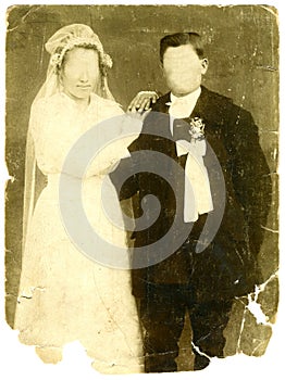 Vintage wedding photo with blank faces