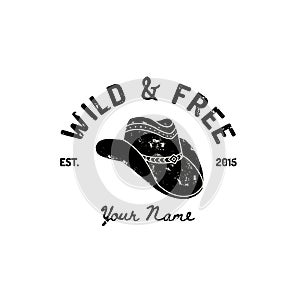 Vintage Western Cowboy Hat Logo. Vector Symbol of the wild West, Texas. US label Retro Typography Grunge Style