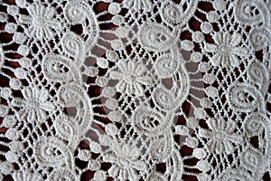 Vintage white perforated lacy fabric