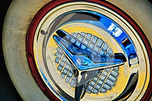 Vintage White Wall Tire and Chrome Hubcap