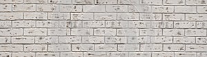 Vintage white wash brick wall texture for design. Panoramic background for your text or image