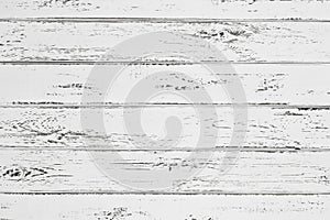 Vintage whitewash painted rustic old wooden horizontal planks wall textured background. Faded natural wood board panel structure. photo