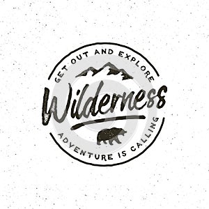 Vintage wilderness logo. hand drawn retro styled outdoor adventure emblem. vector illustration