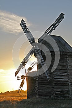 Vintage windmill wooden mill with wind wheel blades
