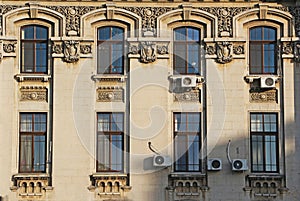 Vintage looking windows on a historic building photo
