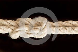 Vintage wite rope with knot