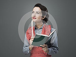 Vintage woman with cookbook