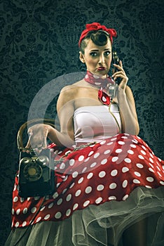 Vintage woman, in old room with dial phone