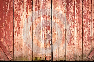 Vintage wood background. Grunge wooden weathered oak or pine textured planks. Aged brown or red color. An old worn barn