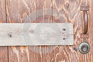 Vintage wood door with rusty handle background texture