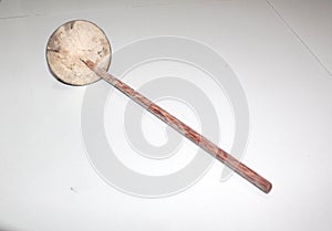 Vintage wood vegetables spoon isolated on white background