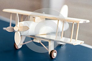 Vintage wooden airplane model. Retro style. Game model. Focus screw.