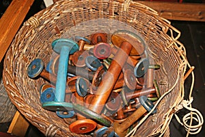 Vintage wooden bobbins in a Victorian mill