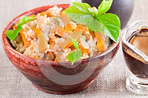 Vintage wooden bowl with cooked rice