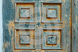 Vintage wooden door and old white wall as background