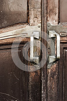 Vintage wooden doors with brass door knobs