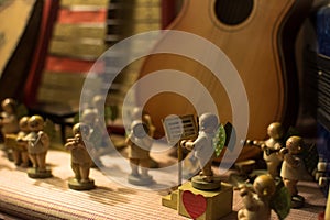 Vintage wooden figures playing musical instruments angels