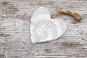 Vintage wooden heart white wash wood background