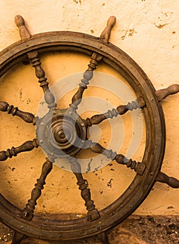 Vintage wooden pirate ship`s wheel