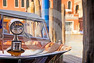 Vintage wooden 1960s speedboat in the Grand Canal, Venice, Italy