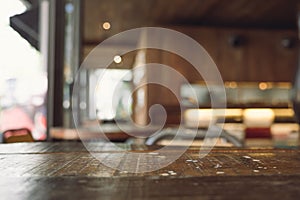 Vintage wooden table with blur bokeh background