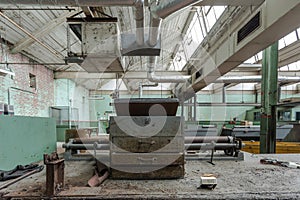 Vintage wooden toolbox on dirty table in an abandoned factory