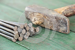 Vintage work tool, hammer and nails