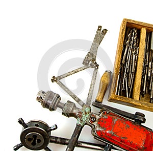 Vintage working tools ( drill and more) on white