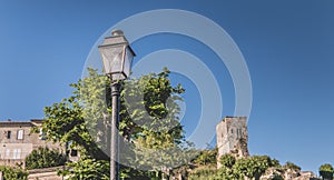 Vintage wrought iron floor lamp in the small town center of Saint Emilion