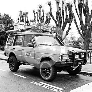 Vintage yellow Land Rover Defender Camel Trophy