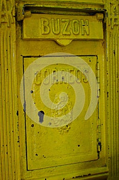 Vintage yellow mail box photo