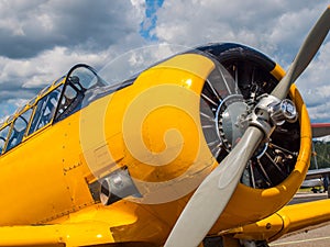 Vintage Yellow Propeller Aircraft