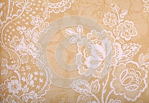 Vintage yellow wallpaper with victorian pattern