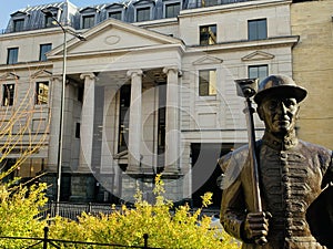 Vintners Place is a 1980s classical style office building in the City of London. It faces the river  Thames