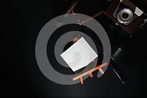 Vinyl plate and retro camera