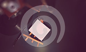 Vinyl plate and retro camera