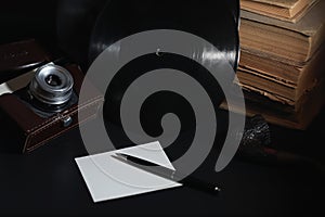 Vinyl plate and retro camera