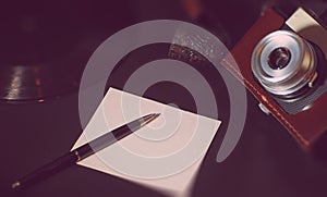 Vinyl plate and retro camera