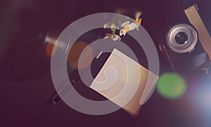 Vinyl plate and retro camera