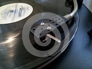 Vinyl player. The plate is on vinyl player