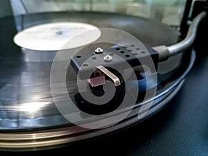 Vinyl player. The plate is on vinyl player