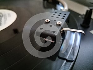 Vinyl player. The plate is on vinyl player