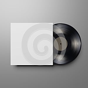 Vinyl record with blank cover on gray background. Mock up template