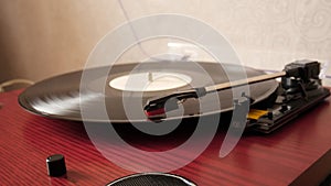 A vinyl record circle is rotating.