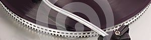 Vinyl record player, close-up, long photo