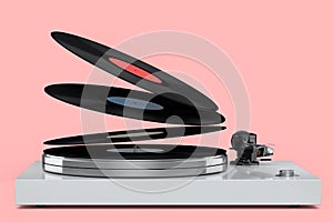 Vinyl record player or DJ turntable with flying vinyl plate on pink background.