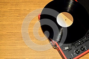 Vinyl record player with vinyl record