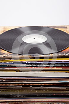 Vinyl record with white label on album covers, white background,